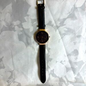 Beautiful rose gold black dial watch w/black vegan leather band. New battery